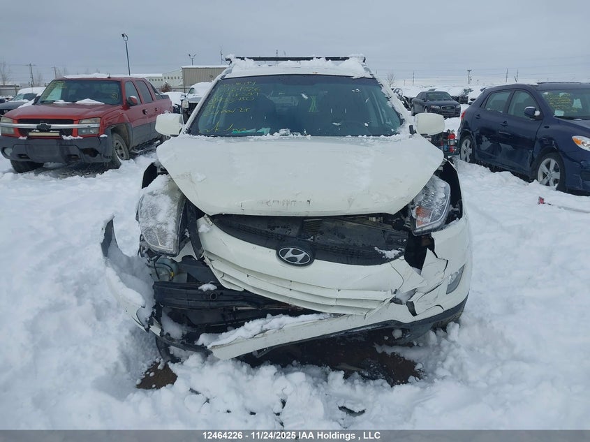 KM8JUCAC9CU433750 2012 HYUNDAI TUCSON photo no. 11
