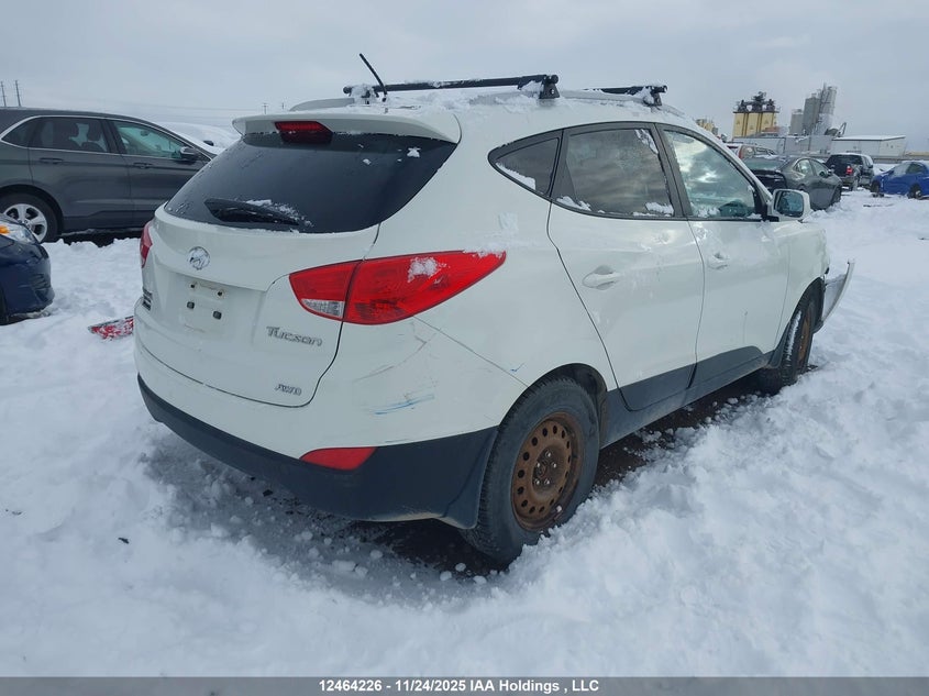 KM8JUCAC9CU433750 2012 HYUNDAI TUCSON photo no. 4