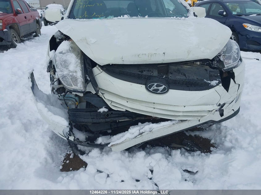 KM8JUCAC9CU433750 2012 HYUNDAI TUCSON photo no. 6