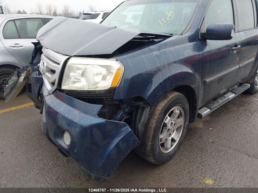 2010 Honda Pilot Touring VIN: 5FNYF4H91AB501090 Lot: 12466787