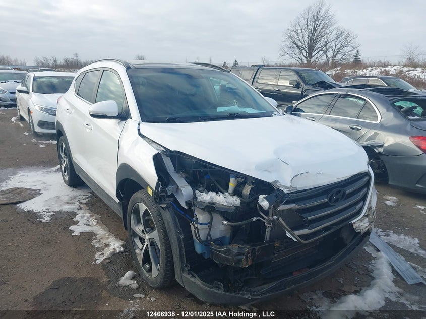 KM8J3CA2XGU187503 2016 HYUNDAI TUCSON photo no. 9