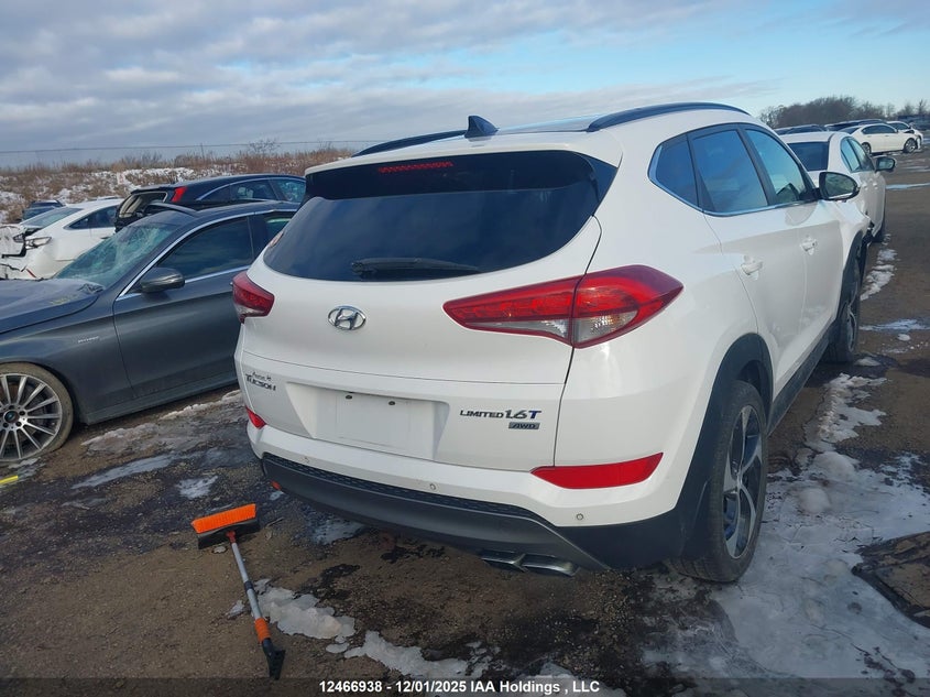 KM8J3CA2XGU187503 2016 HYUNDAI TUCSON photo no. 4