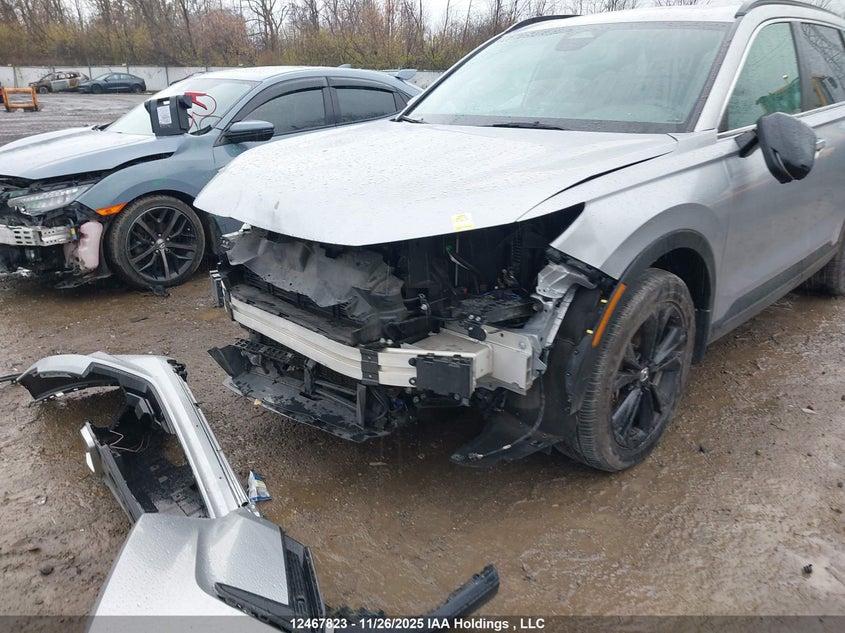 2023 Honda Cr-V Sport Touring VIN: 2HKRS6H95PH204040 Lot: 12467823