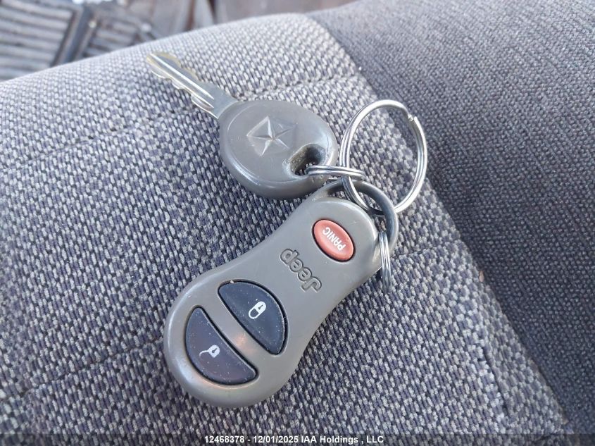 2000 Jeep Grand Cherokee Laredo VIN: 1J4GW48S0YC352008 Lot: 12468378