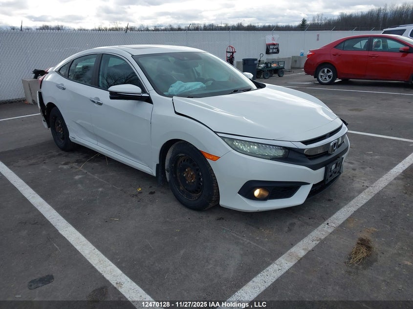 2HGFC1F93HH101409 2017 Honda Civic Touring auction photo 1