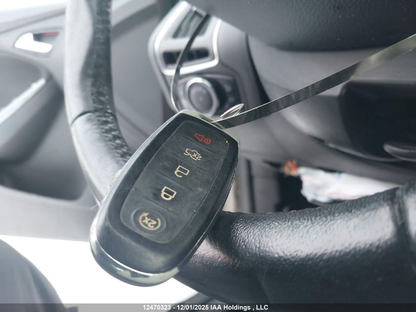 2013 Ford Focus Titanium VIN: 1FADP3N25DL119584 Lot: 12470323