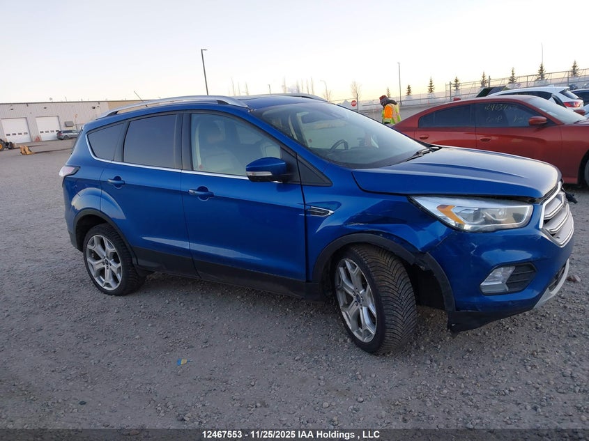 2017 Ford Escape Titanium VIN: 1FMCU9J90HUE10431 Lot: 12467553X