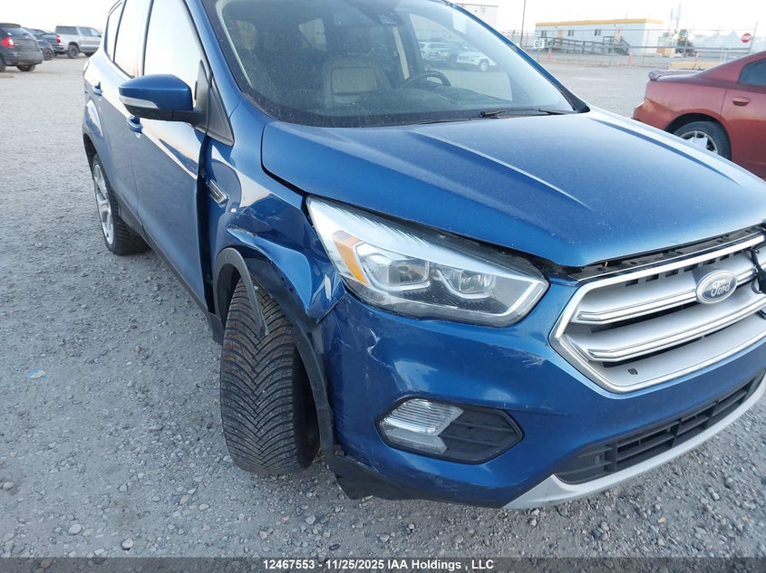 2017 Ford Escape Titanium VIN: 1FMCU9J90HUE10431 Lot: 12467553X