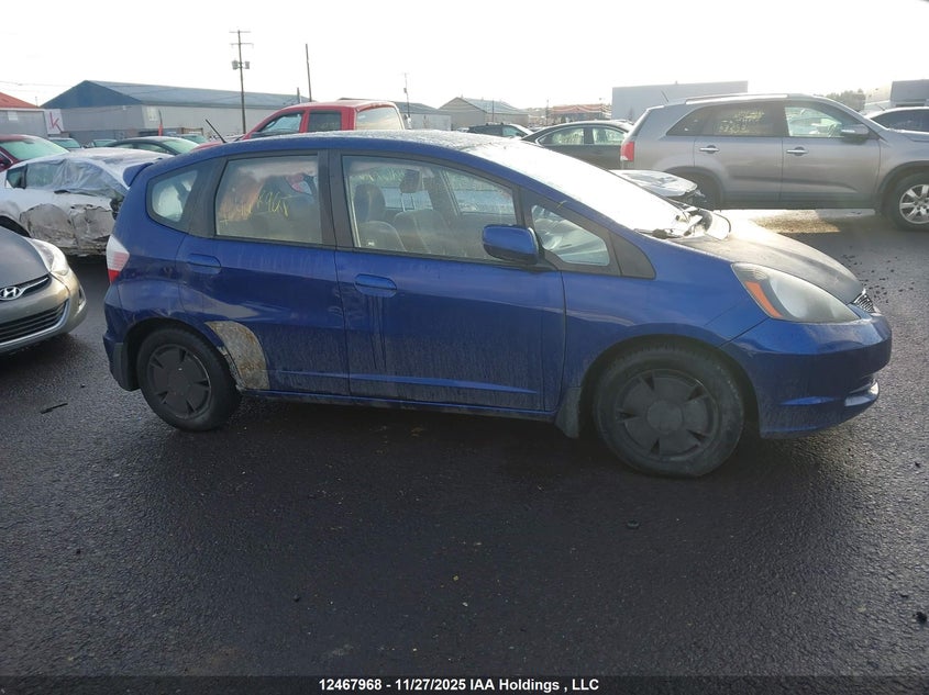 2009 Honda Fit Lx VIN: JHMGE88589S812144 Lot: 12467968X