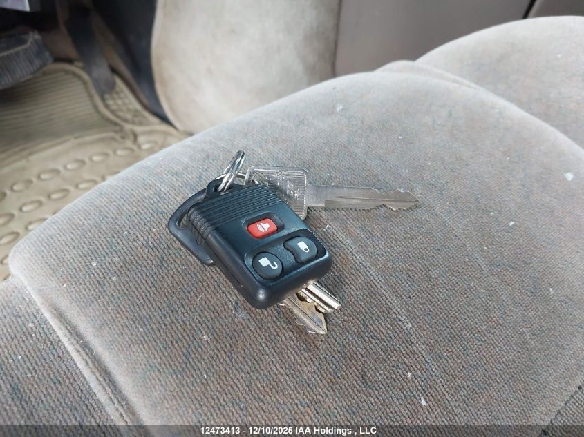 1999 Ford E-150 Commercial/Recreational VIN: 1FDRE14W9XHB17306 Lot: 12473413