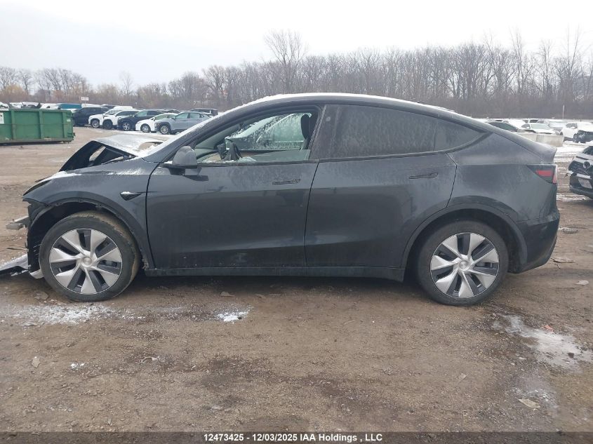 2024 Tesla Model Y Long Range VIN: 7SAYGDEE3RF989407 Lot: 12473425