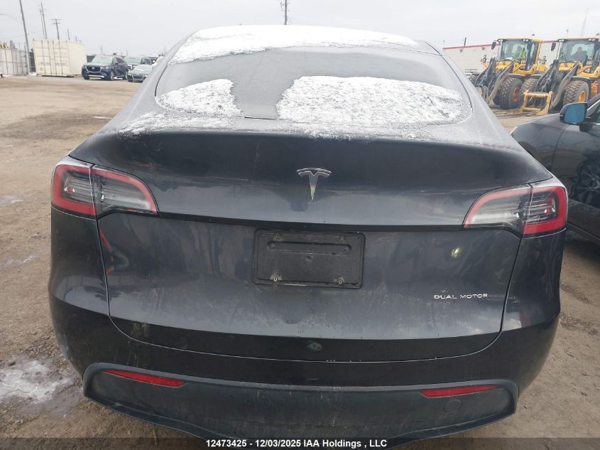 2024 Tesla Model Y Long Range VIN: 7SAYGDEE3RF989407 Lot: 12473425