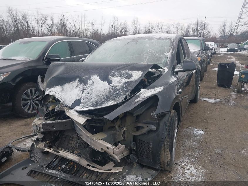 2024 Tesla Model Y Long Range VIN: 7SAYGDEE3RF989407 Lot: 12473425