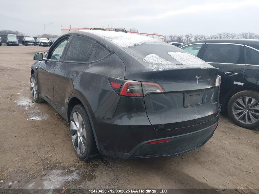 2024 Tesla Model Y Long Range VIN: 7SAYGDEE3RF989407 Lot: 12473425