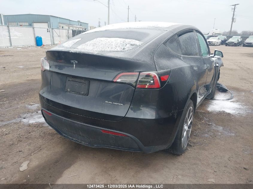 2024 Tesla Model Y Long Range VIN: 7SAYGDEE3RF989407 Lot: 12473425