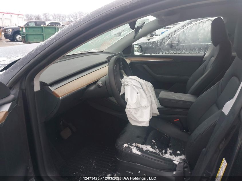 2024 Tesla Model Y Long Range VIN: 7SAYGDEE3RF989407 Lot: 12473425
