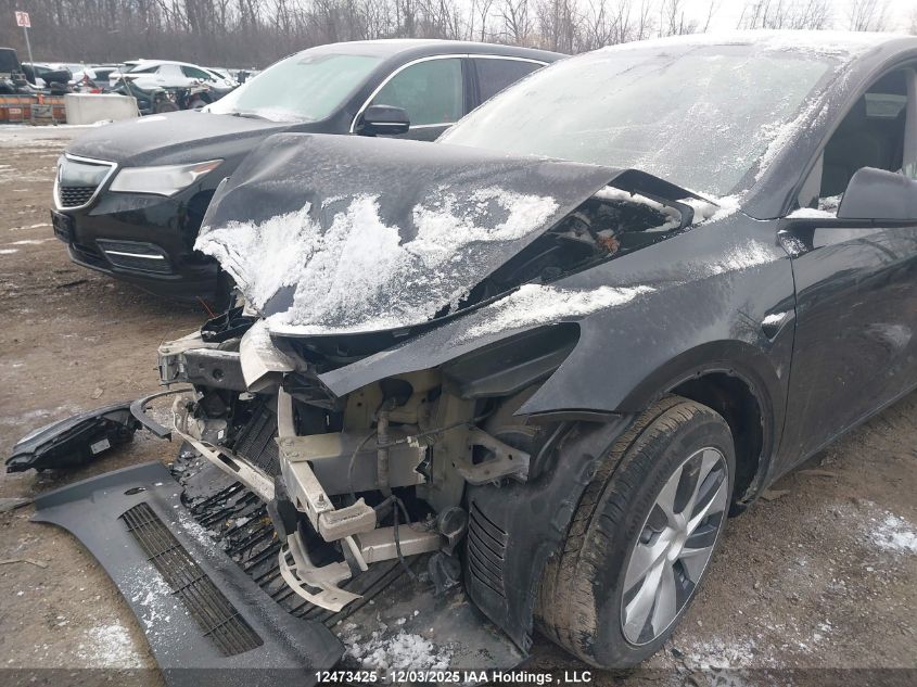 2024 Tesla Model Y Long Range VIN: 7SAYGDEE3RF989407 Lot: 12473425