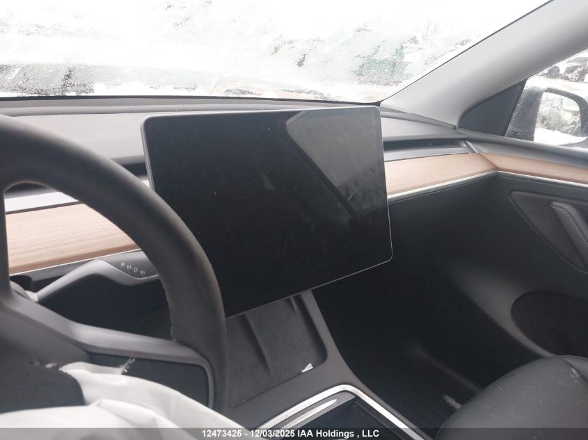 2024 Tesla Model Y Long Range VIN: 7SAYGDEE3RF989407 Lot: 12473425