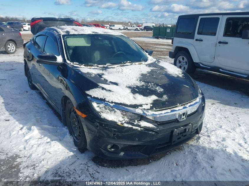 2HGFC1F94GH110666 2016 Honda Civic Touring auction photo 1