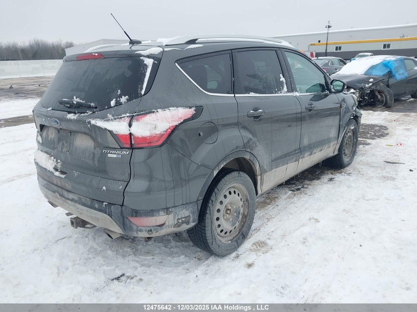 1FMCU9J99HUD46339 2017 FORD ESCAPE photo no. 4