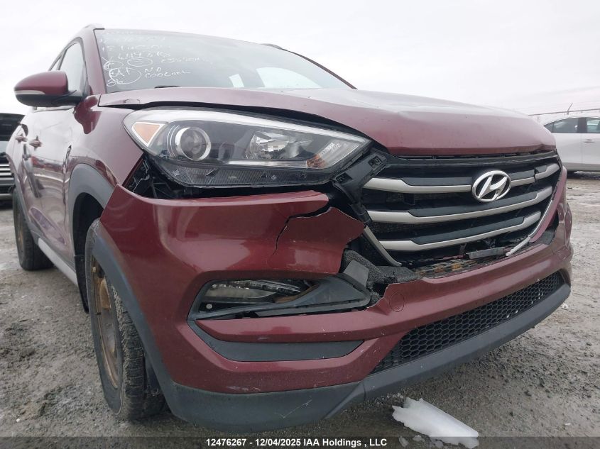 2018 Hyundai Tucson Premium 2.0L VIN: KM8J3CA43JU649876 Lot: 12476267