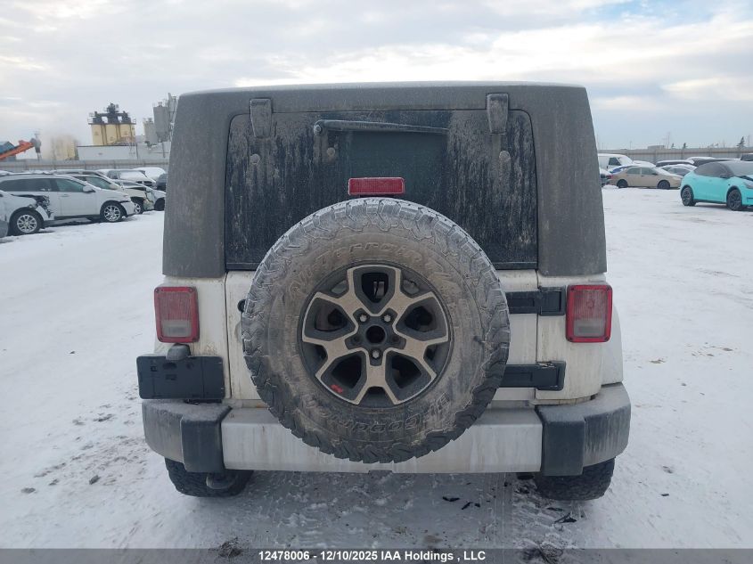 2010 Jeep Wrangler Sahara VIN: 1J4AA5D1XAL220175 Lot: 12478006