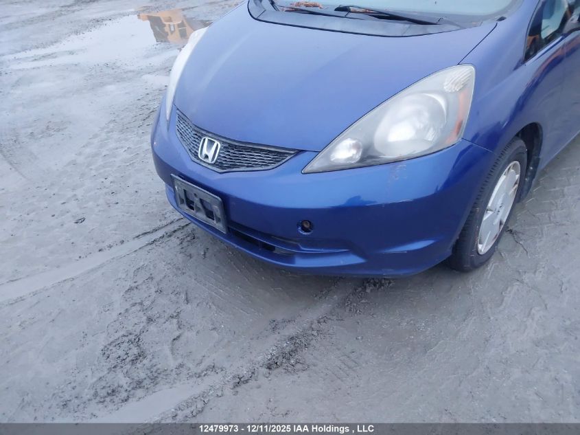 2009 Honda Fit VIN: JHMGE88539S813492 Lot: 12479973