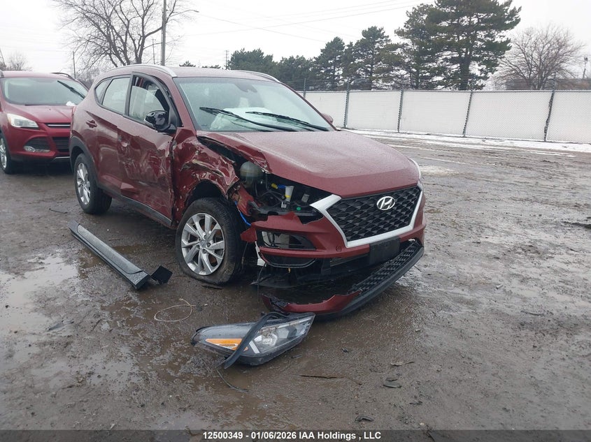 KM8J3CA49KU045282 HYUNDAI TUCSON Photo 1