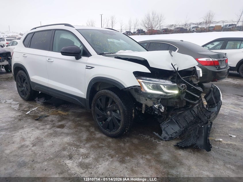 3VVLX7B28RM123900 VOLKSWAGEN TAOS Photo 1