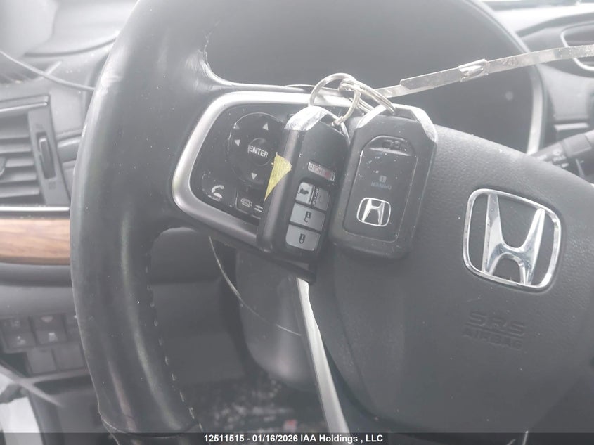 2019 Honda Cr-V Touring VIN: 2HKRW2H94KH141535 Lot: 12511515