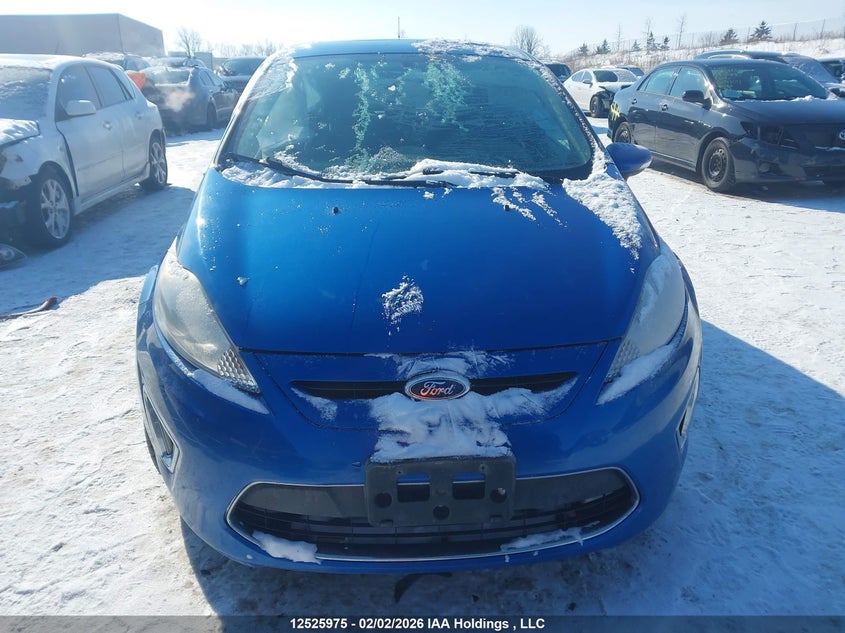 2011 Ford Fiesta Ses VIN: 3FADP4FJ1BM215557 Lot: 12525975