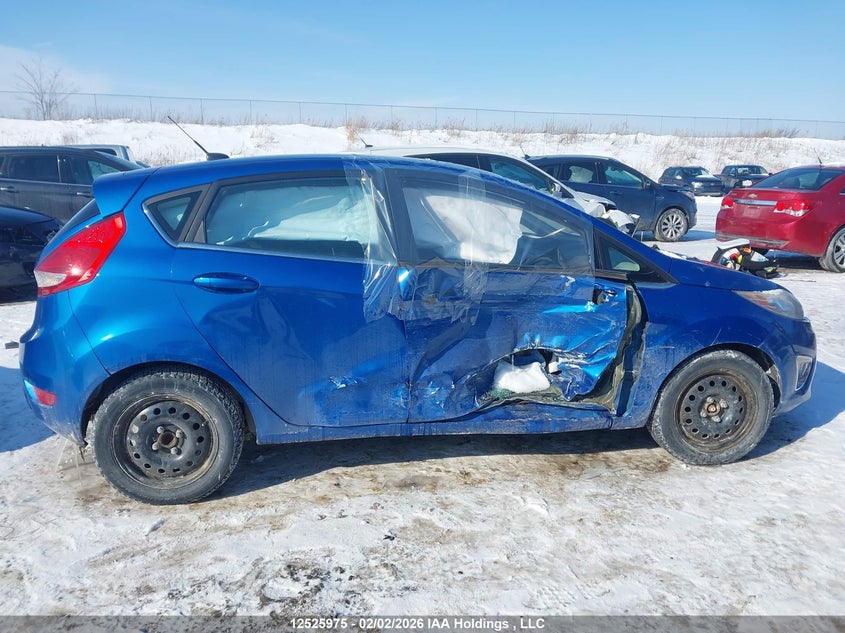 2011 Ford Fiesta Ses VIN: 3FADP4FJ1BM215557 Lot: 12525975