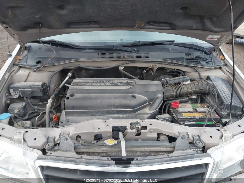 2003 Honda Odyssey Ex-L VIN: 2HKRL18063H011343 Lot: 12529573