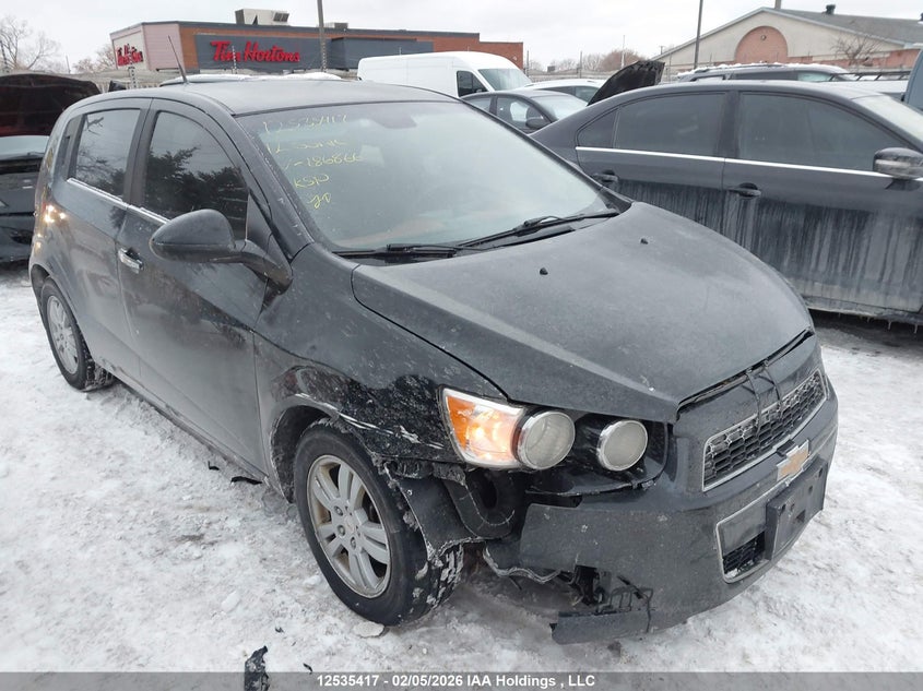 1G1JC6EH2C4186899 CHEVROLET SONIC Photo 1