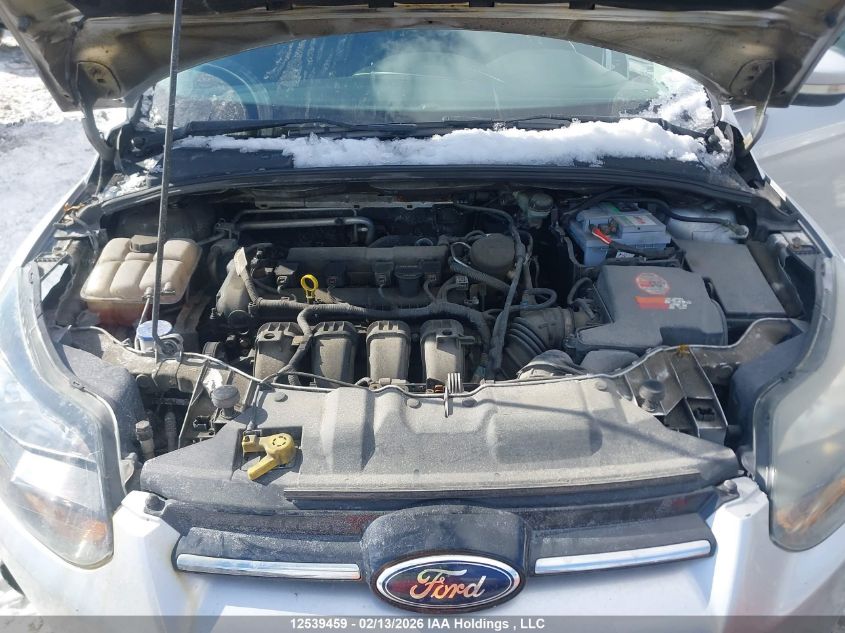 2014 Ford Focus Titanium VIN: 1FADP3J22EL158494 Lot: 12539459