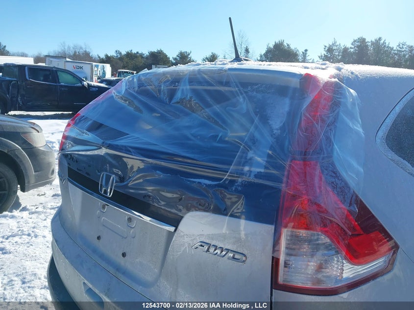 2013 Honda Cr-V Exl VIN: 2HKRM4H75DH102732 Lot: 12543700