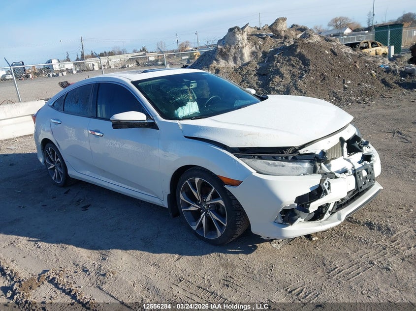 Vin: 2hgfc1f93lh100303, lot: 2949015, honda civic touring 2020 img_1