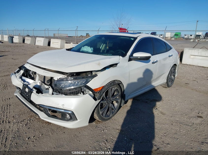 Vin: 2hgfc1f93lh100303, lot: 2949015, honda civic touring 20202