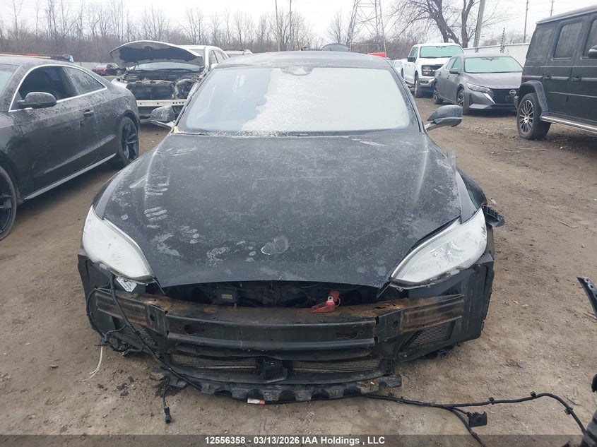 2015 Tesla Model S VIN: 5YJSA1E23FF106216 Lot: 12556358