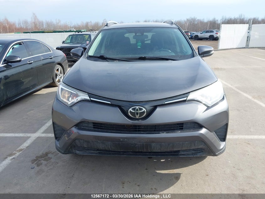 2018 Toyota Rav4 Le VIN: 2T3ZFREV8JW409844 Lot: 12567172