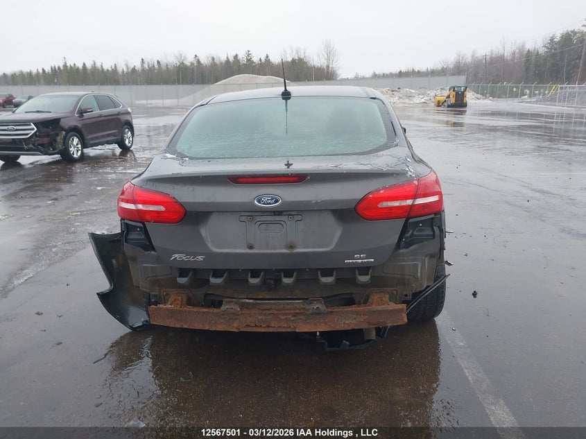 2015 Ford Focus Se VIN: 1FADP3F23FL309319 Lot: 12567501