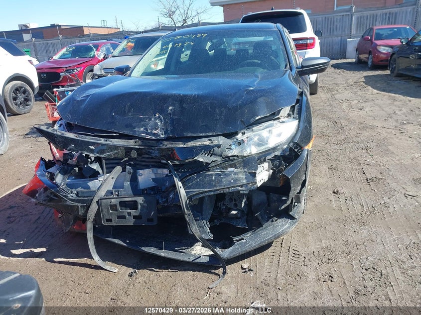 2018 Honda Civic VIN: 2HGFC2F59JH042374 Lot: 12570429