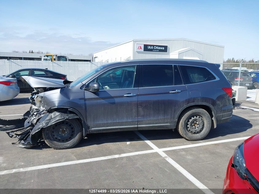 2022 Honda Pilot Touring 8P VIN: 5FNYF6H92NB504503 Lot: 12574499