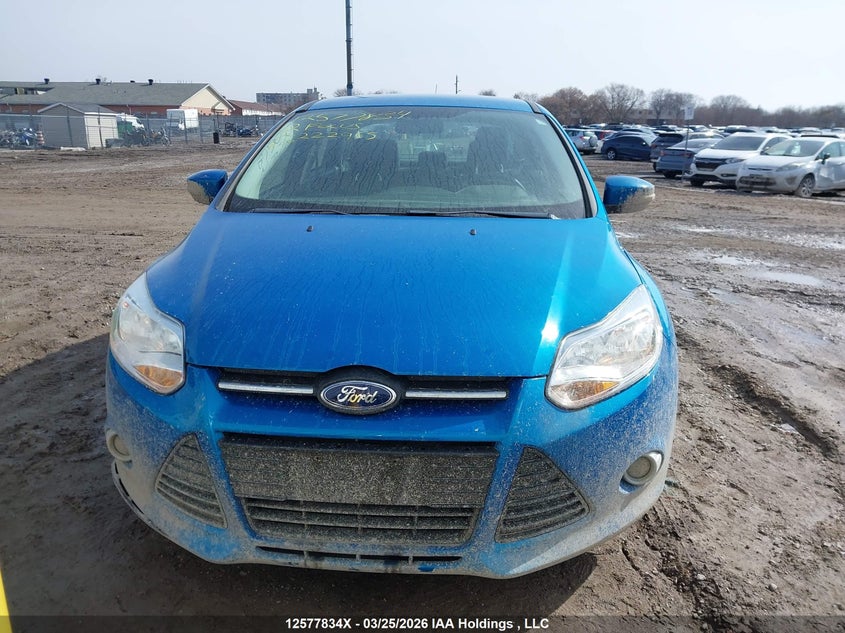 1FAHP3F28CL222965 2012 Ford Focus 2.0 Se Blue
