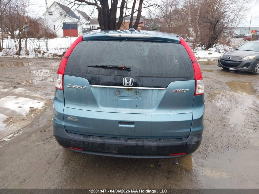 2014 Honda Cr-V Exl VIN: 2HKRM4H77EH110025 Lot: 12581347