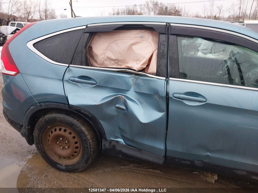 2014 Honda Cr-V Exl VIN: 2HKRM4H77EH110025 Lot: 12581347