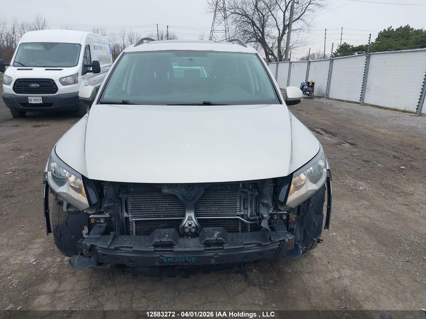 2014 Volkswagen Tiguan Comfortline/Highline/Trendline VIN: WVGJV3AX8EW517663 Lot: 12583272