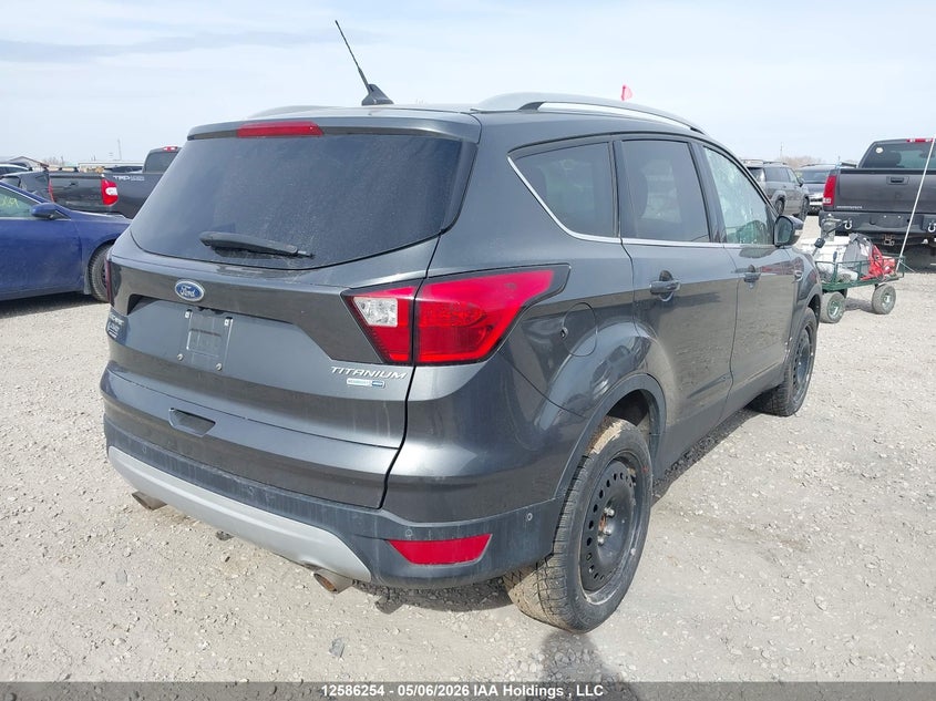 2019 Ford Escape Titanium VIN: 1FMCU9J92KUB35877 Lot: 12586254