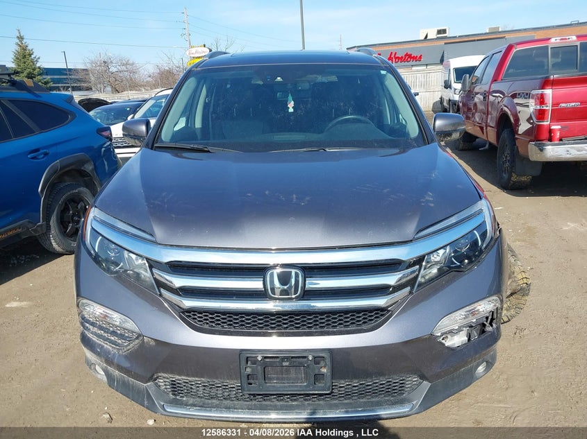 2017 Honda Pilot Touring VIN: 5FNYF6H95HB508341 Lot: 12586331