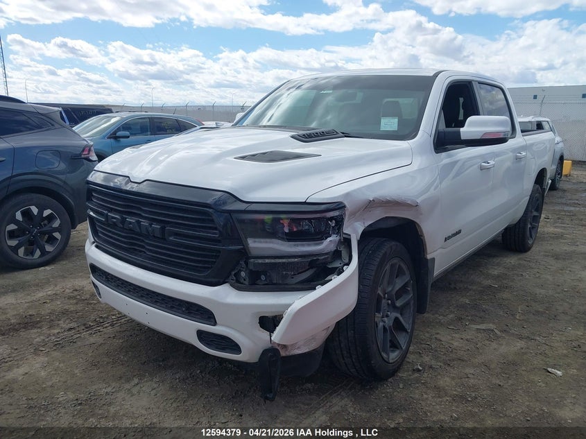 2022 RAM 1500, Left Side, IAAI, VIN 1C6SRFVT2NN365351 — photo 2
